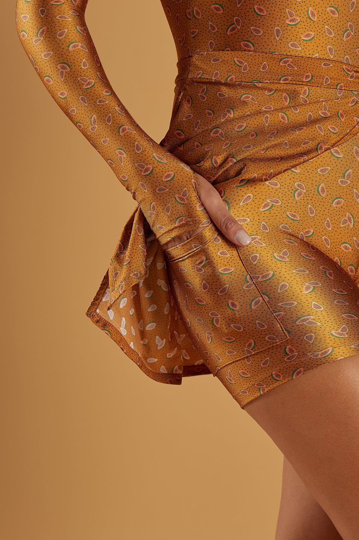 Nova Rio Tennis Skirt Golden Papaya close-up of high-rise waistband and flared skirt