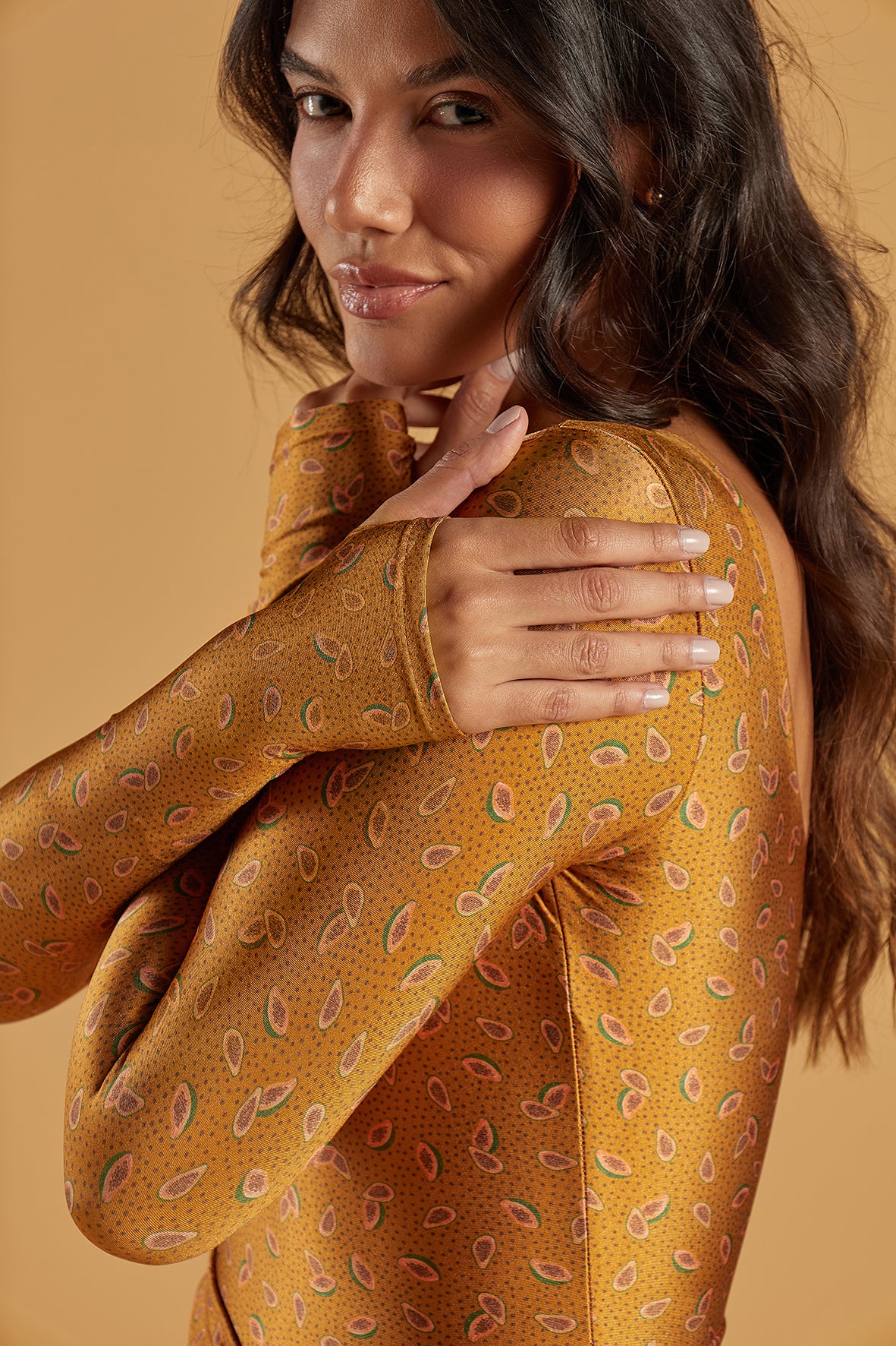 Nova Rio Wrap Dress Golden Papaya close-up of premium Brazilian fabric and sleeve